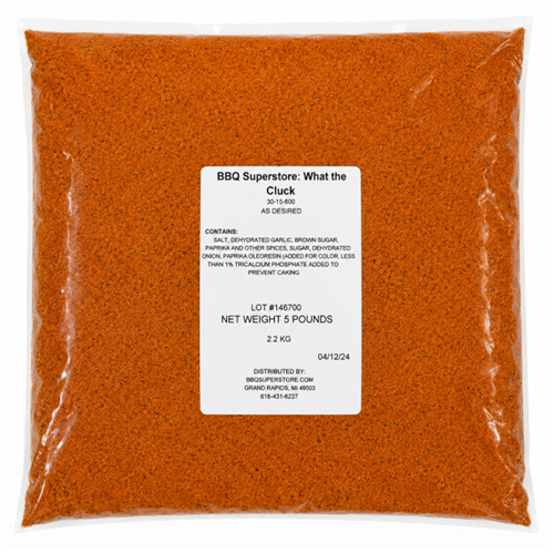 Bag of orange powder with a label on a white background