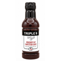 Bottle of Triple 9 Judgement Day Competition Sauce on a white background