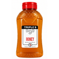 Bottle of Triple 9 999 Honey with a red cap on a white background