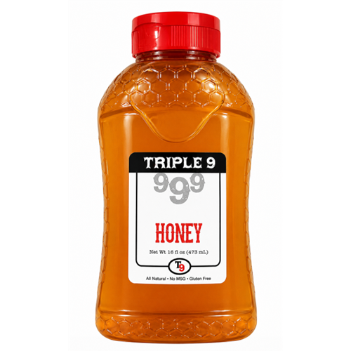 Bottle of Triple 9 999 Honey with a red cap on a white background